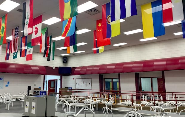Mandatory flags in Alberta schools prompt debate on free expression