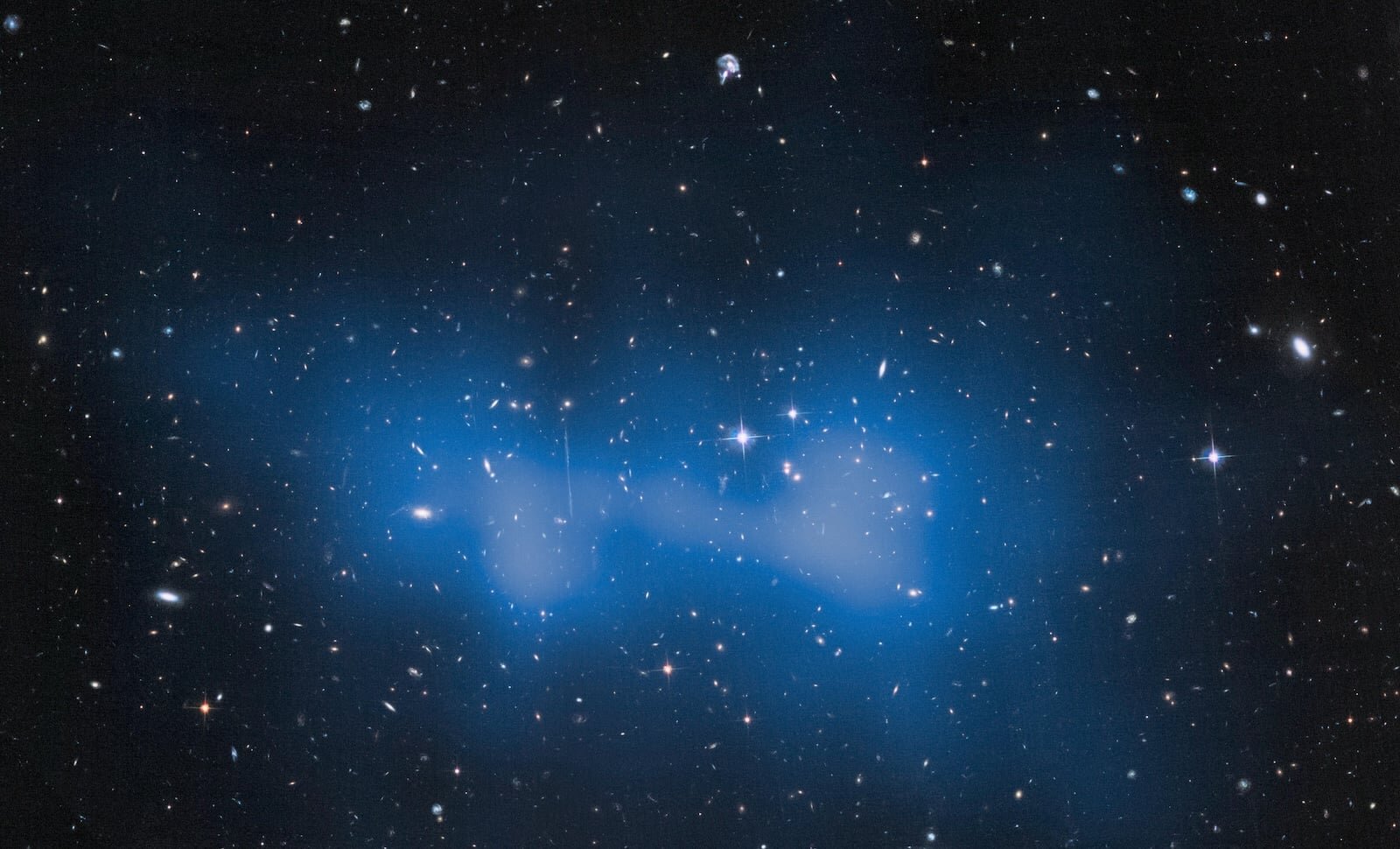 Mysterious Galaxy Clusters Illuminate Dark Matter's Hidden Nature
